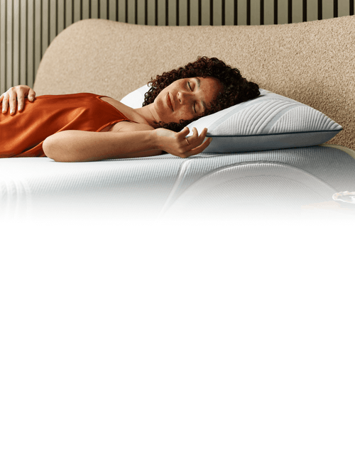 woman laying on a Tempur Adapt pillow and mattress